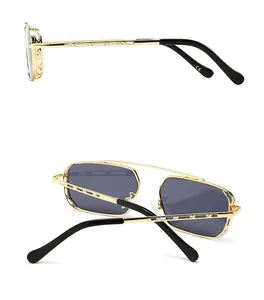 Detail view of gold metal sunglasses frame with woven texture temples and CE certification