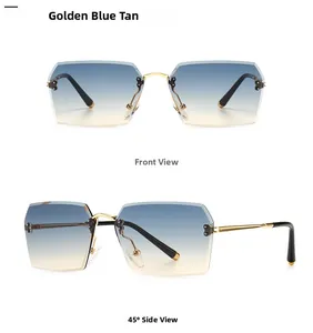 Close-up of rimless polygon sunglasses with gold metal frame and blue tea gradient lenses