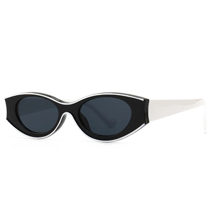 Retro rock style cat-eye sunglasses with black frames and white temples for a modern look