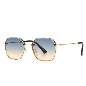 Modern retro polygon sunglasses with gold metal frame and blue-orange gradient lenses