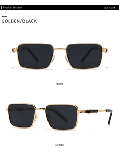 Detail view of golden metal rectangular sunglasses with black lenses and side accents