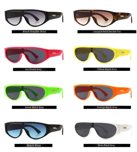 Close-up of modern round shield sunglasses in eight assorted colors with golden accents