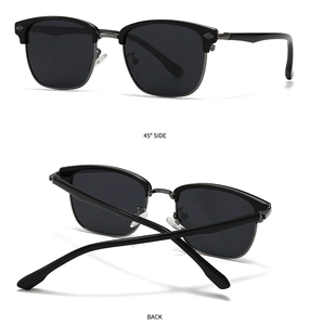 Detail view of retro clubmaster sunglasses featuring black frames and metallic embossing