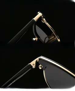Detailed macro view of the premium golden metal hinges and inner frame of black sunglasses