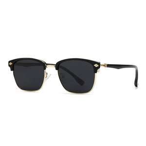 Classic polarized clubmaster sunglasses with black upper frame and gold metal accents