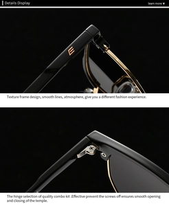 Vue macro de la charnière en métal doré et détails du logo sur la monture noire de lunettes