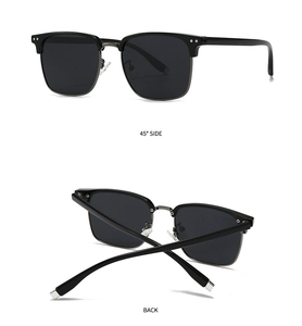 Detail view of semi-rimless sunglasses with black frame and gunmetal bridge accents