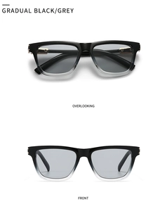 Modern butterfly sunglasses with gradual black and grey frames and golden metal hinges