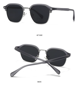 Detail view of polarised sunglasses featuring grey-purple frames and silver metal accents
