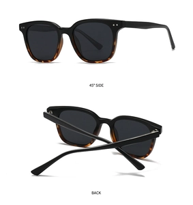 Vues détaillées des branches écaillées et rivets argentés sur lunettes de soleil rétro