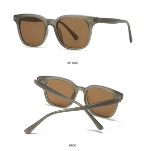 Détails de lunettes de soleil carrées gris mat avec rivets argentés et verres bruns