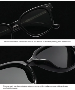 Détail d'une monture de lunettes noire brillante avec rivets et plaquettes en silicone