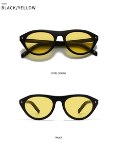 Lunettes de soleil rétro monture noire verres jaunes et accents dorés élégants