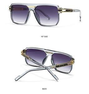 Detail view of square aviator sunglasses with gradient purple lenses and golden metal accents