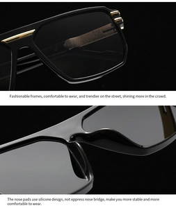 Macro detail of black pilot sunglasses featuring gold metal accents and integrated nose pads