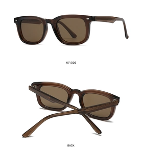 Detail of square polarized sunglasses with brown frames and silver rivet accents