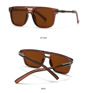 Détail de lunettes aviateur avec texture métallique argentée sur monture marron