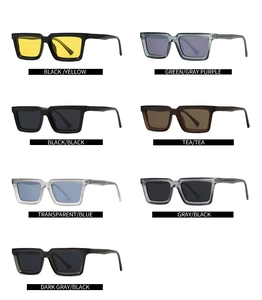 Flat lay of polarized square sunglasses in seven assorted color combinations on white background