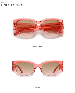 Front and top view of cat eye sunglasses with pink tea gradient lenses and gold metal accents