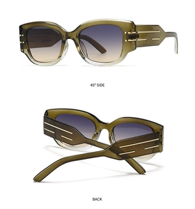 Detail view of translucent olive green sunglasses with gradient lenses and gold temple accents