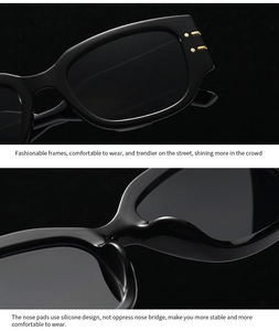 Detail of sleek black cat-eye sunglasses featuring golden temple accents and silicone nose pads