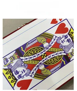 Detailed view of King of Hearts playing card print on white square box clutch bag