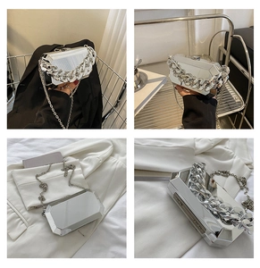 Octagonal silver mirror box bag with chunky metal chain handle and thin strap detail
