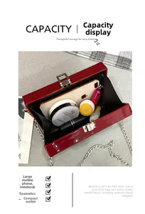 Internal capacity of red patent leather poker bag with phone and cosmetics