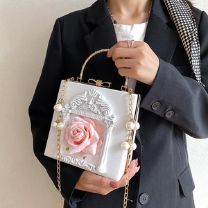 White box bag with 3D pink rose, baroque relief and pearl chain, worn on model