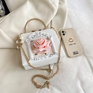 White square box bag with 3D pink rose relief, gold chain and elegant pearl handle