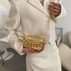 Chic gold metallic box clutch bag with bold chunky chain and mirror finish crossbody style