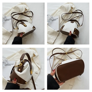 Detailed four-way views of a white faux croc texture bag with brown trim and gold clasp