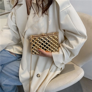 Chic gold metallic clutch bag with quilted hollow design and chain shoulder strap
