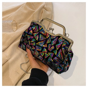 Detailed close-up of retro shell clutch bag featuring colorful sequins and silver clasp