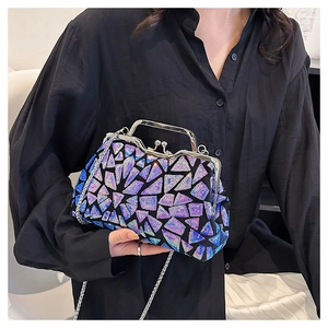 Detailed macro of iridescent sequin shell bag with silver metal frame clasp and chain