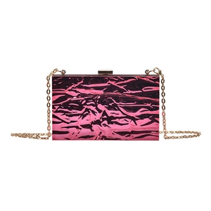 Fuchsia quilted metallic evening bag with gold chain strap and stylish textured surface
