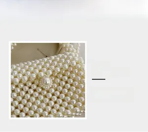 Macro detail of high-gloss imitation pearl weave and elegant round pearl clasp on handbag