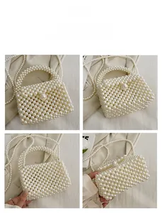 Detail view of handmade white pearl woven handbag with fixed handle and crossbody chain
