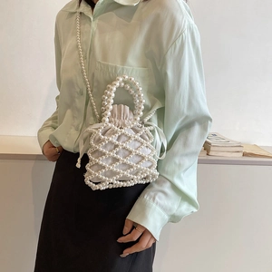 Elegant white pearl woven handbag with drawstring lining for women beach or party