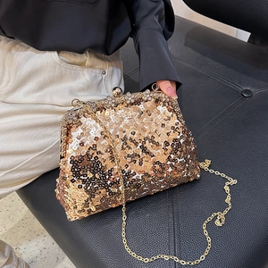 Sparkling gold sequin evening clutch bag with crystal floral clasp and metal chain strap