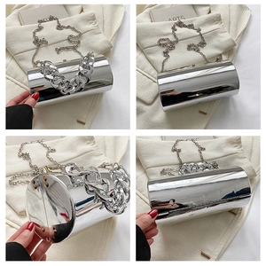 Detailed four-way view of silver cylindrical bag with metallic finish and thick chain