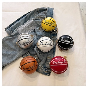 Detail shot of mini basketball chain bags in six colors with gold metallic straps