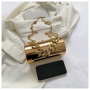 Top view of metallic gold cylindrical clutch bag with thick chain and long strap