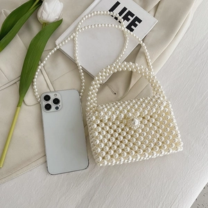 Elegant pearl beaded mini handbag with shoulder strap and pearls buckle closure