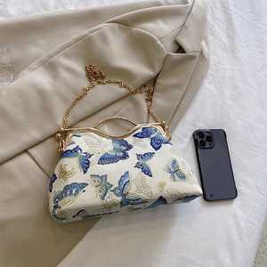 Retro butterfly embroidery handbag with golden metal handles and elegant chain strap
