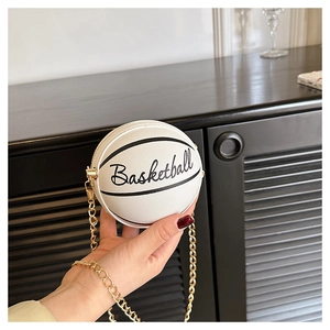Close-up of mini basketball chain bag in white PU leather with gold metal hardware