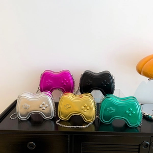 Creative game controller crossbody bags in vibrant metallic colors with chain straps