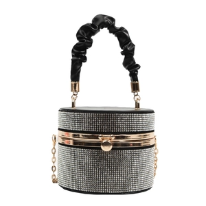 Sparkling silver rhinestone cylinder evening bag with black ruched handle and gold chain