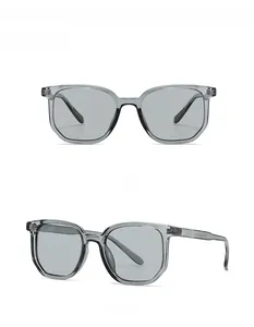 Front and side view of grey translucent square sunglasses with light grey lenses