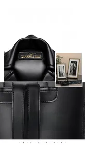 Detail view of black textured leather backpack with gold metal brand logo and fine stitching